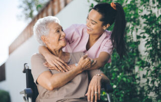 Local home care caregiver providing compassionate support to a senior woman in Hawaiʻi, helping her age safely and comfortably at home.